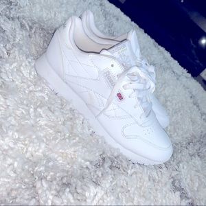 White Reebok sneakers